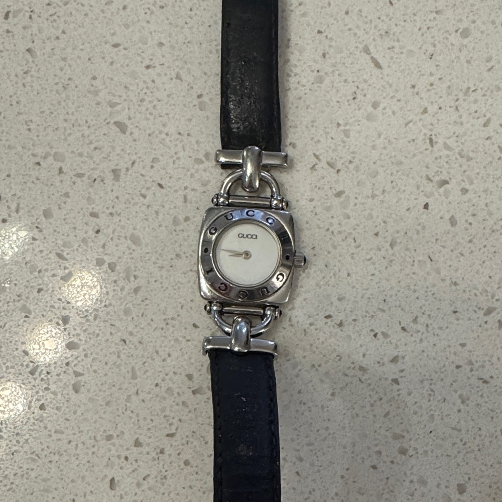 Authentic Gucci Black and Silver Timepiece
